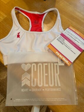 Coeur Women's White Racerback Pocket Sports Bra with Red Lining